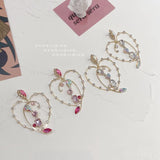 lutaotie Dizzy in Love Spin Drop Earrings